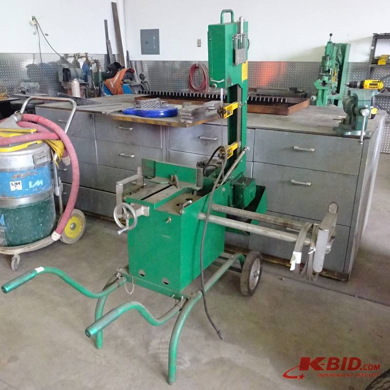 lot 11 image: Band saw on wheels.