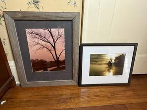 lot 14 image: Framed Nature Art Prints - Tree Silhouette at Sunset & Misty Lake Landscape (Pair)