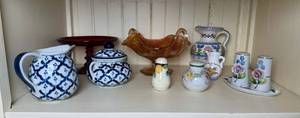 lot 26 image: Decorative Ceramic Collection - Blue & White Pitcher, Lidded Jars, Amber Glass Centerpiece (Lot of 9)