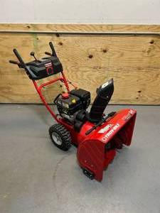 lot 43 image: Troy-Bilt 24 in. Two-Stage 208cc Electric Start Self Propelled Gas Snow Blower Storm 2410 Model