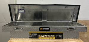 lot 63 image: Northern Tool  Equipment Crossover Truck Toolbox with Removable Tray, 69in. x 20in. x 13in., Aluminum, Diamond Plate, Pull Handle Latches #41897 Msrp $409.99