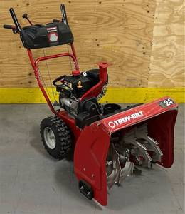 lot 333 image: Troy-Bilt Storm  2420 Snow Blower Model# 31AS6KN2B23 Msrp $1,199.99