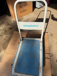 Shepherd brand folding platform transport cart.