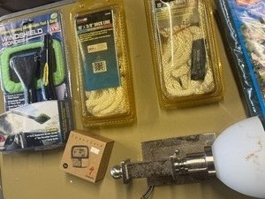 Various garage lot  jumper cables , dock line , wall lamp , window winder ect