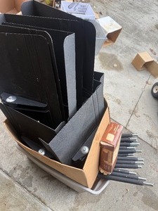 Parts for about 1416 music stands.