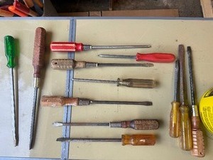 Lot of LARGE screw drivers.