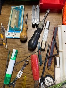 Box of various hardware and equipment