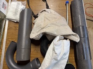 Box of lawn equipment pipingtubes and bags