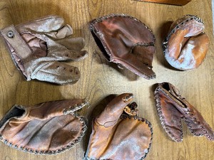 Lot of vintage baseball gloves.