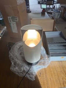 Floor lamp , powers up. Comes in box and wrapping