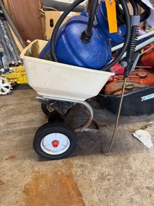 Vintage Red Devil broadcast spreader and a Hudson 2-gallon pump-less sprayer. Get your lawn in tip top shape