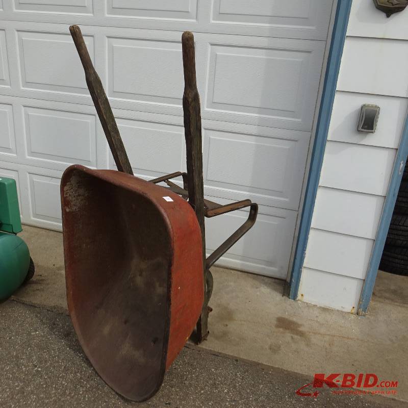lot 5 image: True temper 6 cu ft steel wheel barrow