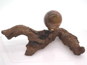 lot 47 image: Agate Sphere - Brown Banding On Wood Stand