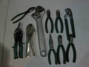 lot 79 image: Large crescent wrench, vise grips, ...