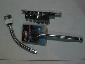 lot 69 image: 6pc 12in drive SAE sockets on rail...