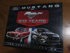 lot 518 image: Mustang metal sign...