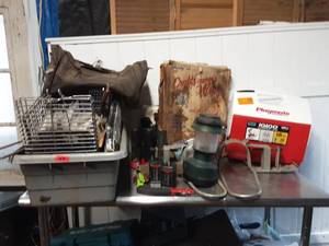 Assortment of cooking and camping supplies