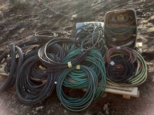 Huge lot of assorted hose, garden hose and more