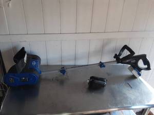 Snow Joe cordless snow shovel with battery and charger