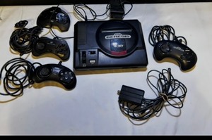 Original Sega Genesis system model 1 console with controllers