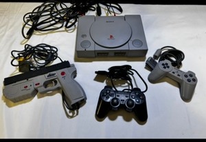 Vintage 90s PlayStation Console with controllers & light gun