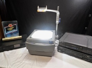 Overhead projector, Toshiba vhs vcr, Mitsubishi vcr, and more