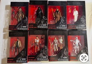 Collection of Star Wars action figures in boxes