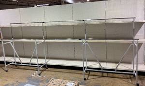 lot 203 image: Commercial Garment Rack Double Rail On Casters 179x72x23
