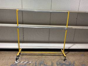 lot 206 image: Commercial Garment Rack Double Rail On Casters 37.5x66.5x20