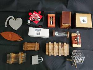 lot 29 image: One Tough Puzzle - Assorted Wooden Mechanical Puzzles & Boxes