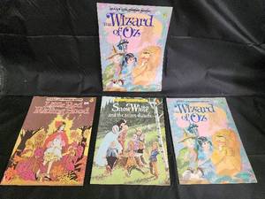 lot 44 image: Wizard of Oz Giant Coloring Book (2) - Snow White & the Seven Dwarfs - Little Red Riding Hood