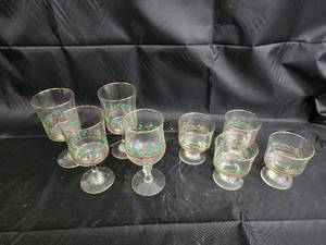 lot 48 image: Clear Glass Goblets - Set of 9 with Red and Green Floral Border, Gold Rim