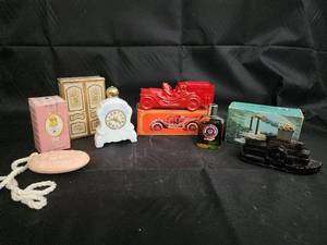 lot 50 image: Vintage Mantel Clock, Tussy Soap Medallion, Oval Soap, Red Fire Engine, Aftershave Bottle