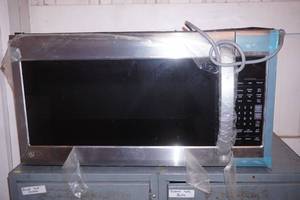 under-the-counter LG Microwave Oven (scratch & dent) working condition unknown