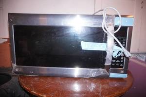 under-the-counter LG Microwave Oven (scratch & dent) working condition unknown