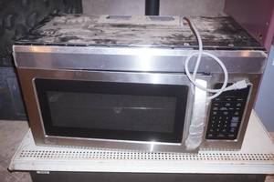 under-the-counter LG Microwave Oven (scratch & dent) working condition unknown
