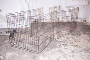 Pet Fence. Collapsible. 8 Panels 24x24 each, 1 has a door