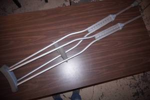 Adjustable Aluminum Crutches (one does not have a foot)