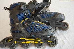 Youth Roller Blades. Adjustable Size 1-4
