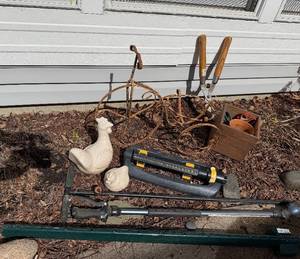 Ceramic Bird Statues & Rusty Garden Tools
