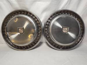 Vintage set of 2 Chevy Hubcaps