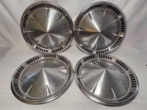 Vintage 1959 Plymouth hubcaps - Lot of 4