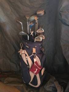 Golf bag full of goodies with clubs included- Lot of 14 pieces