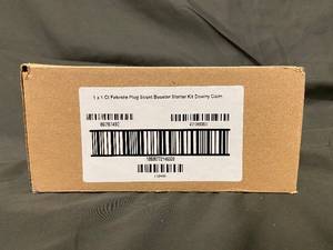 lot 16 image: Febreze Plug Scent Booster Starter Kit