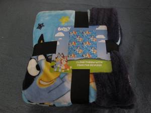 lot 27 image: Bluey plush throw...