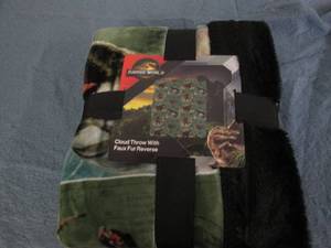 lot 8 image: Jurassic World cloud throw...