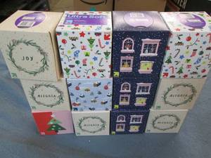 12 Boxes of assorted facial tissue...