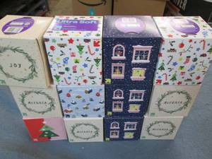 12 Boxes of assorted facial tissue...