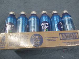 18 Cans of 20oz Pure Life water...