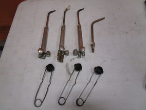 lot 107 image: Torch Heads